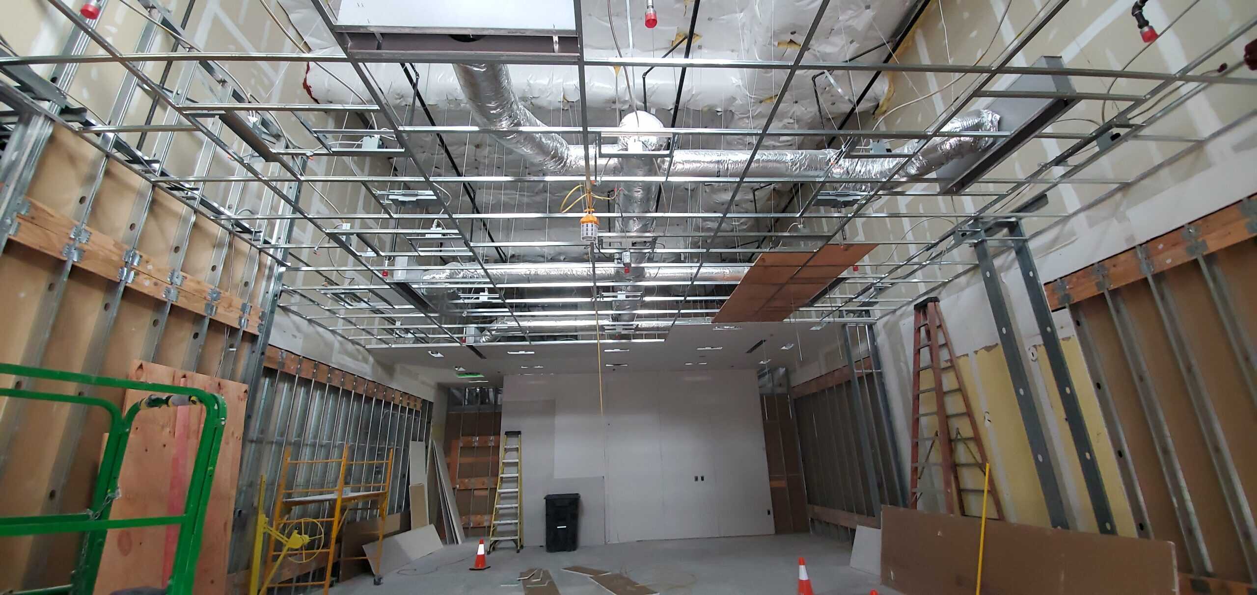 Ceiling grid and ductwork looking up Easton Town Center PaintWerks