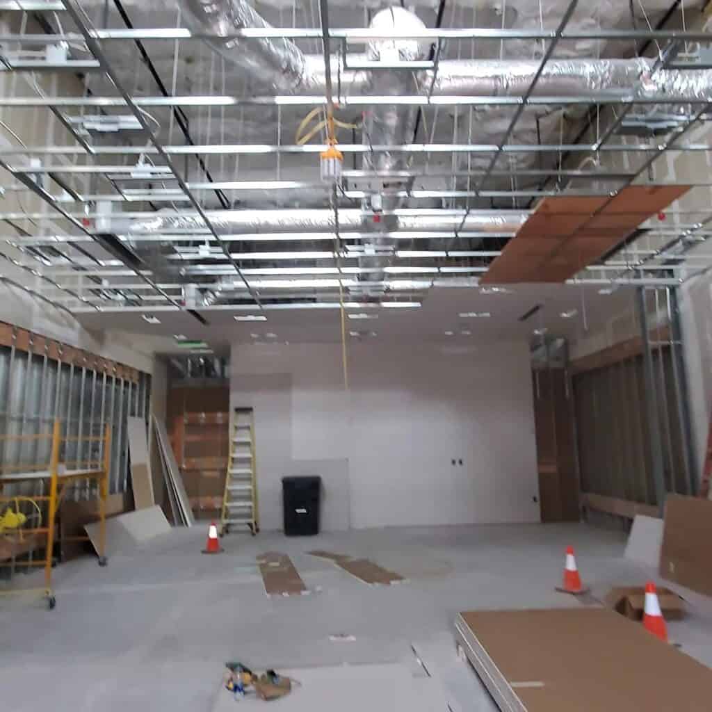 Interior construction progress photos from Easton Town Center retail fit-out by PaintWerks.
