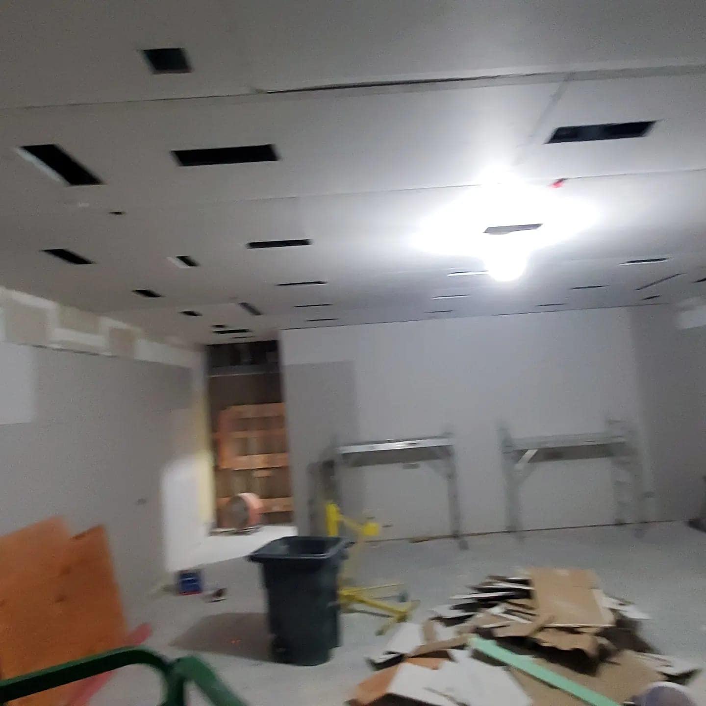 Drywall ceiling hung light cutouts Easton Town Center PaintWerks