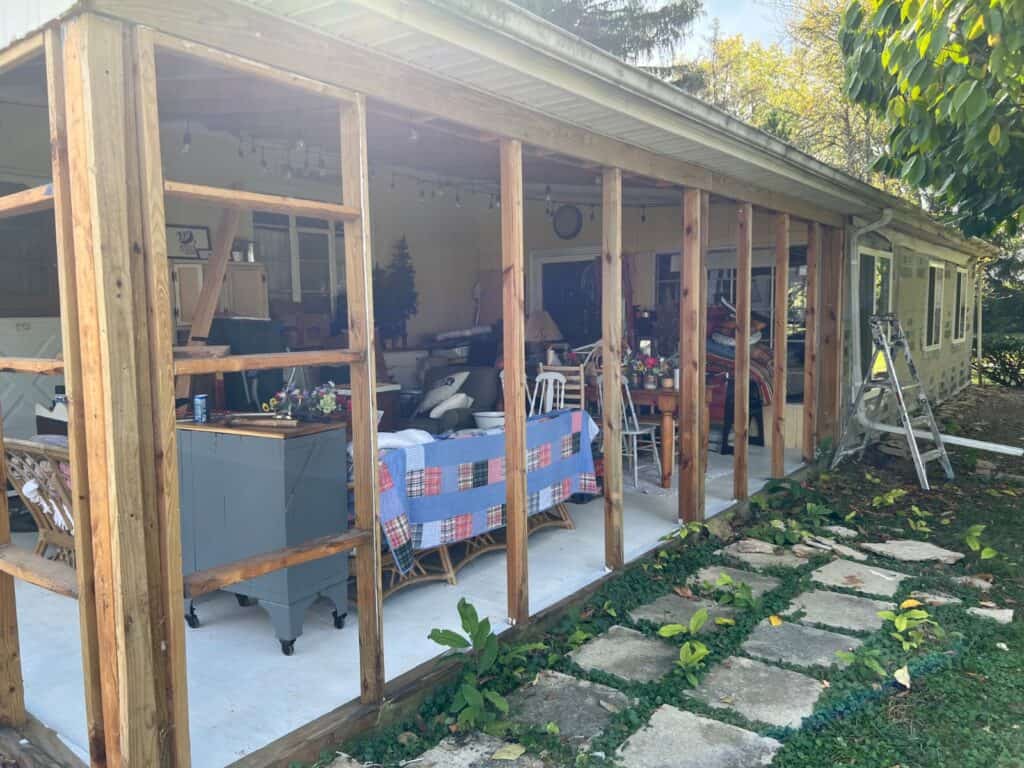 Exterior rebuild in Worthington, Ohio with new framing, sheathing, windows, and LP SmartSide board and batten siding installed by PaintWerks.