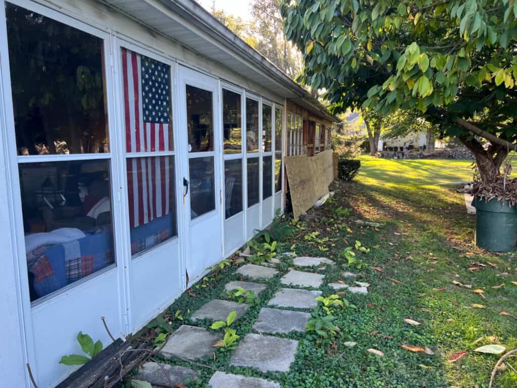 Exterior rebuild in Worthington, Ohio with new framing, sheathing, windows, and LP SmartSide board and batten siding installed by PaintWerks.