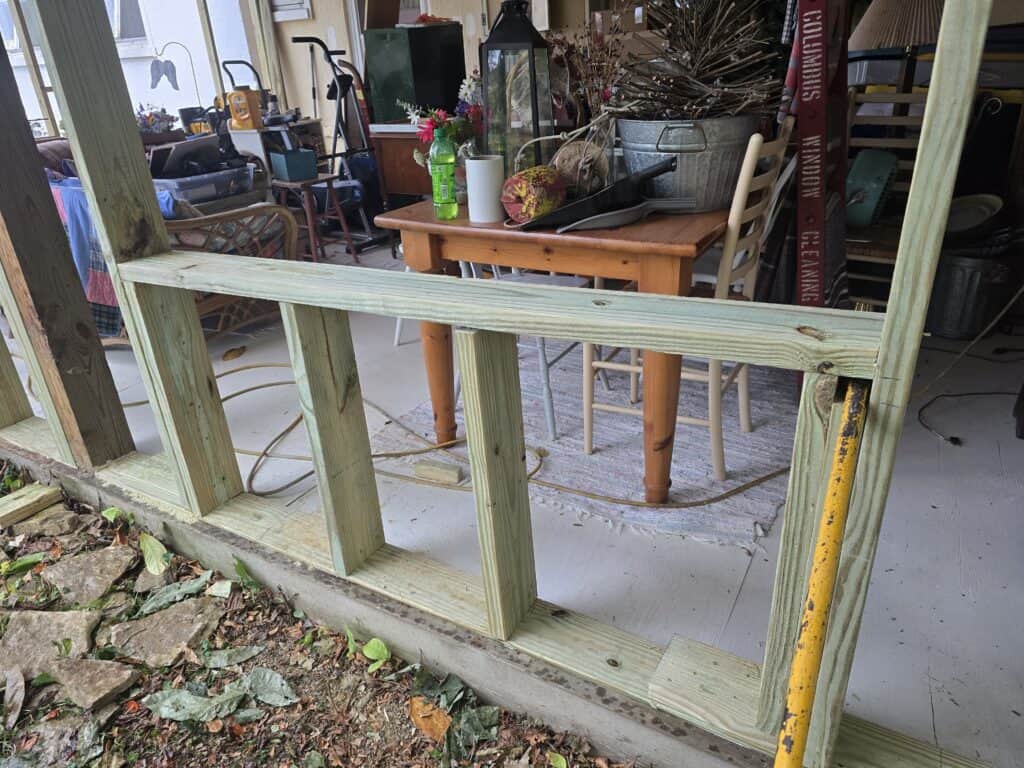 Exterior rebuild in Worthington, Ohio with new framing, sheathing, windows, and LP SmartSide board and batten siding installed by PaintWerks.
