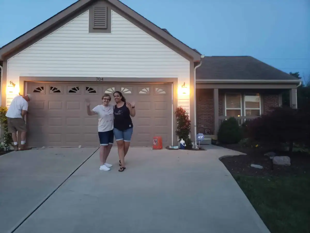 Happy Columbus homeowners after exterior painting project completion