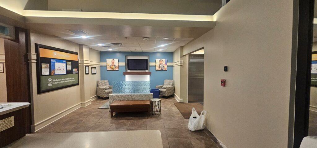 Commercial Interior Renovation – Drywall Repair, Block Filling, Trim Installation & Full Paint Package