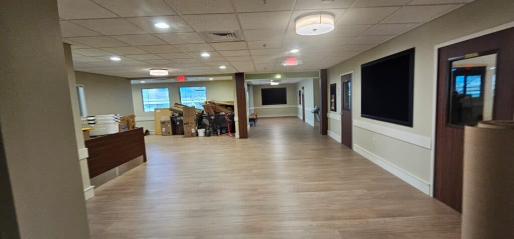 Commercial Interior Renovation – Drywall Repair, Block Filling, Trim Installation & Full Paint Package