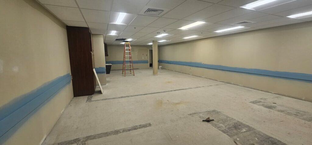 Commercial Interior Renovation – Drywall Repair, Block Filling, Trim Installation & Full Paint Package