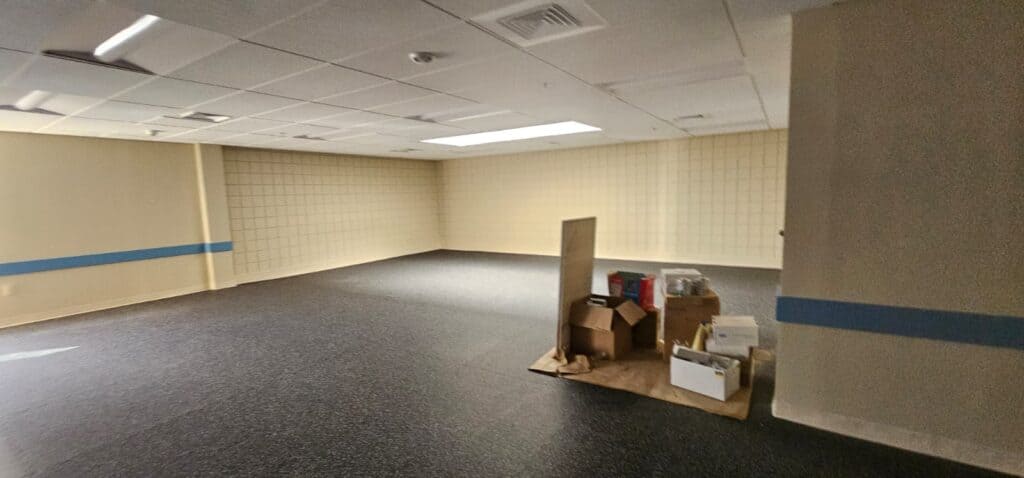 Commercial Interior Renovation – Drywall Repair, Block Filling, Trim Installation & Full Paint Package