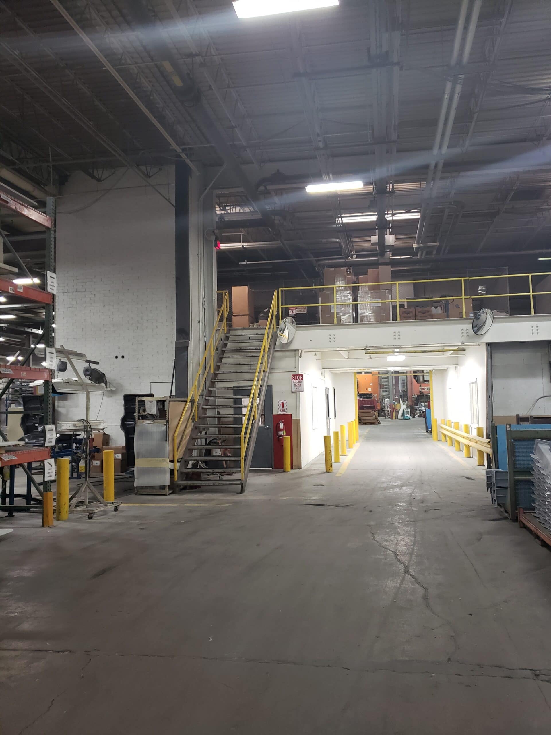 Industrial epoxy coating on CMU block walls in manufacturing facility Columbus Ohio