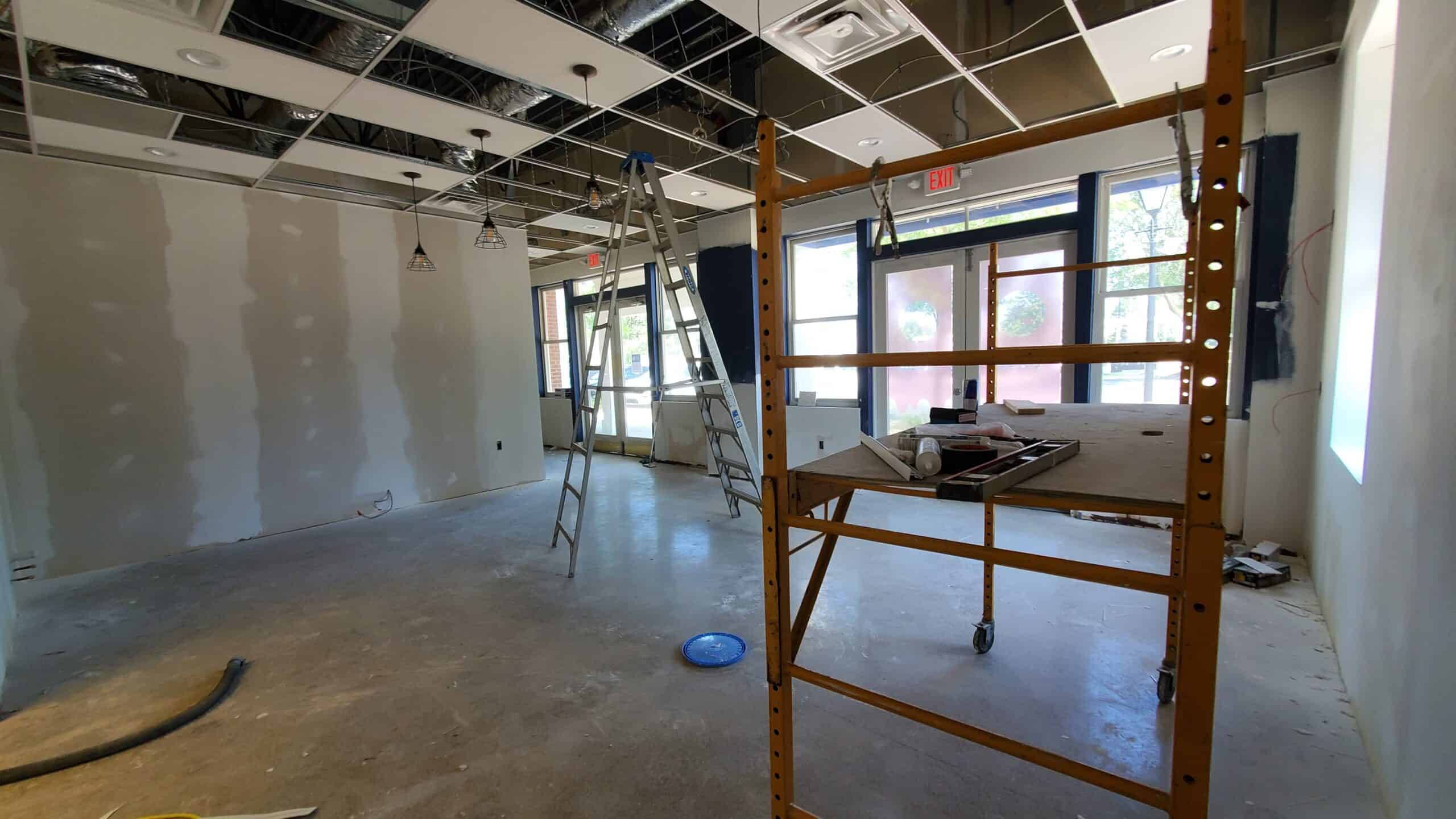 Suspended ACT drop ceiling grid installation in commercial building Columbus Ohio by PaintWerks