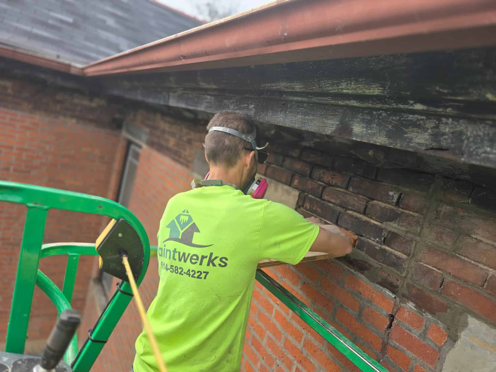 PaintWerks tuckpointing brick boom lift 90 E Lincoln St Columbus OH
