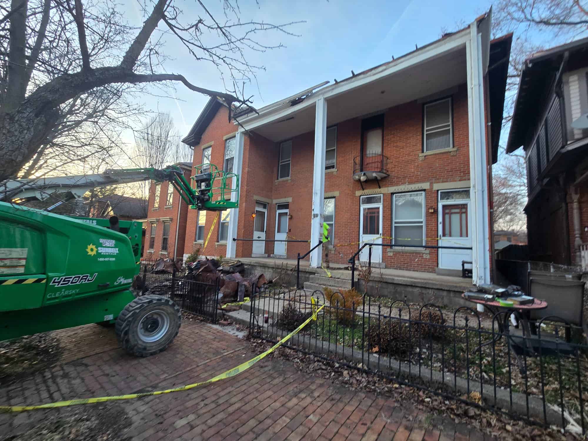 Boom lift new porch columns 90 E Lincoln St Italian Village Columbus OH