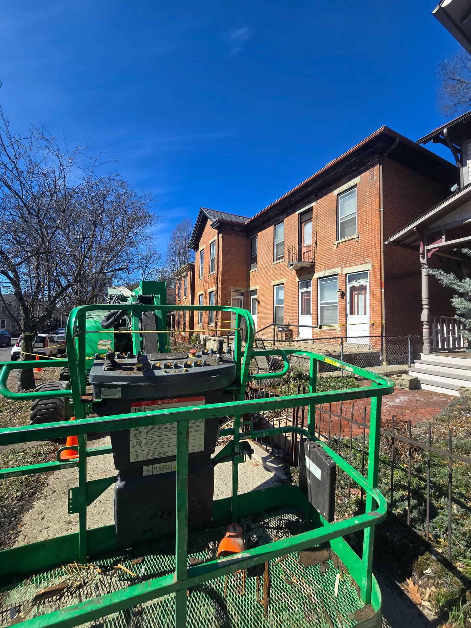 Boom lift view historic brick building 90 E Lincoln St Columbus Ohio PaintWerks